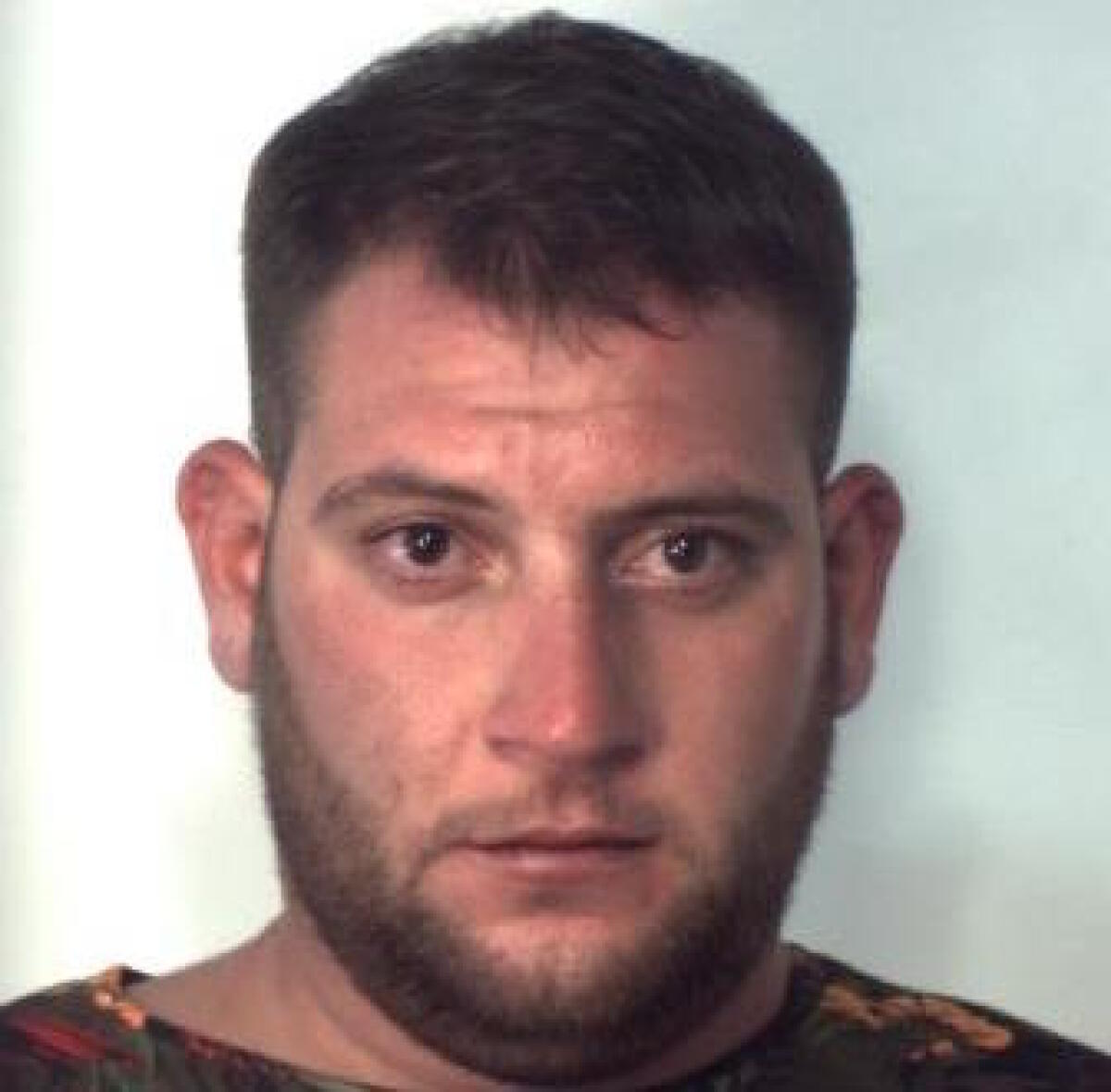 CATANIA: PRENDE UN UOMO A PUGNI IN FACCIA PER RUBARGLI L'AUTO - 