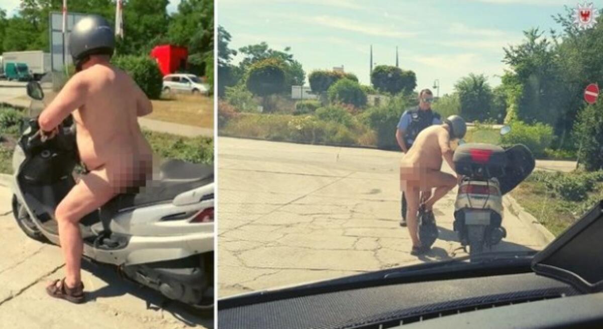 CALDO: IN GERMANIA POLIZIA FERMA MOTOCICLISTA NUDO IN SCOOTER - 