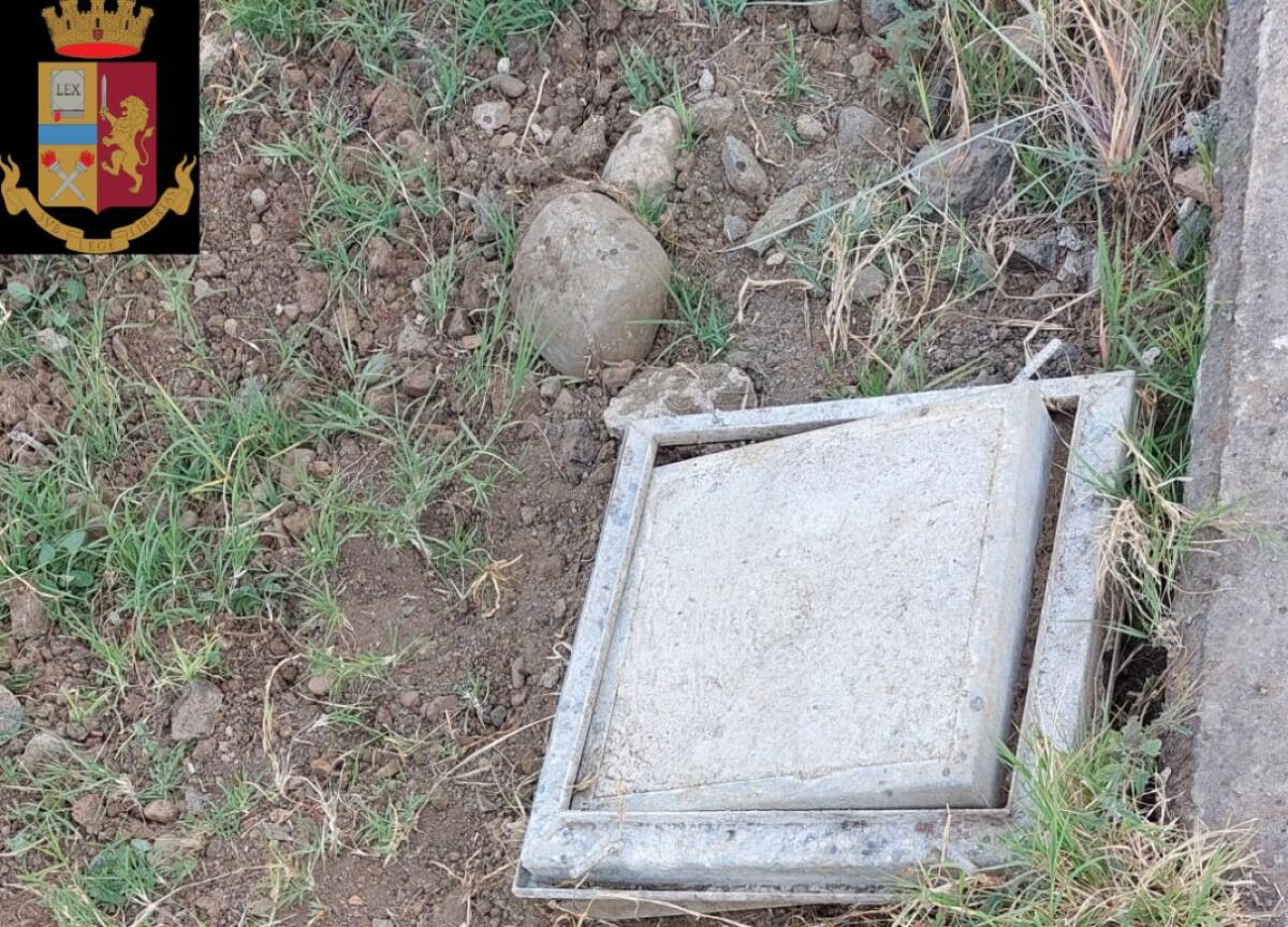 CATANIA: APRE I TOMBINI DELLA PUBBLICA ILLUMINAZIONE PER POI TAGLIARE E ASPORTARE  IL RAME. - 