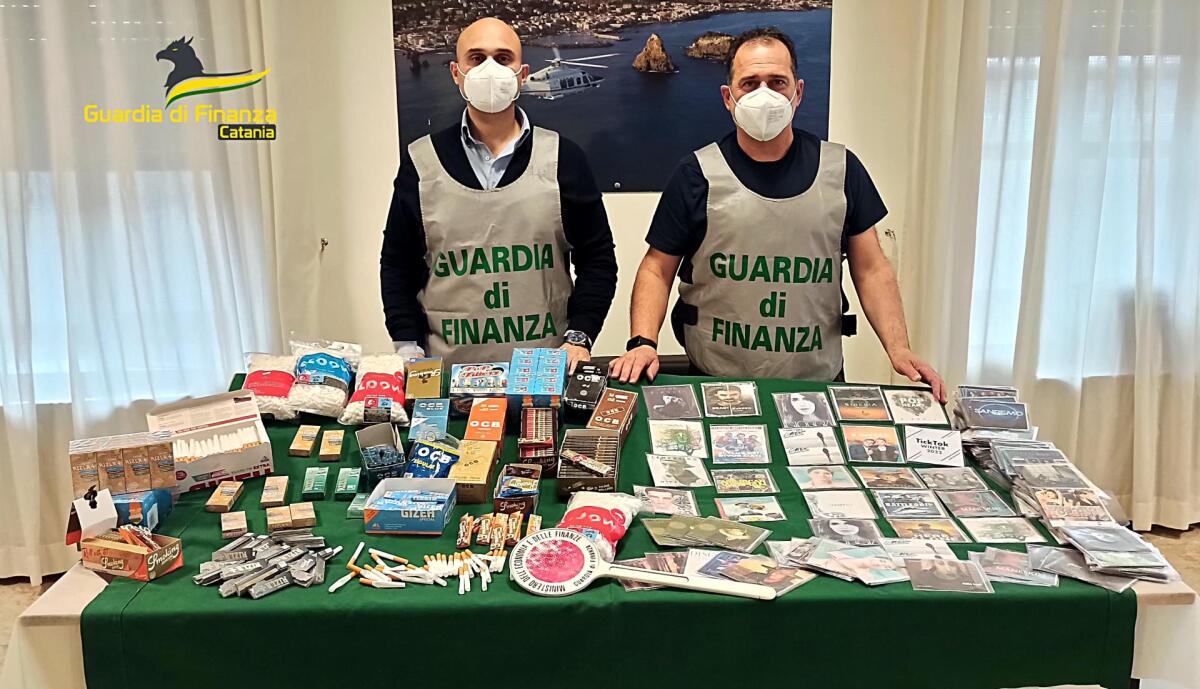 CATANIA: SEQUESTRATI OLTRE 600 MILA ARTICOLI TRA CD E DVD PRIVI DEL MARCHIO SIAE E PRODOTTI DA FUMO VENDUTI IN ASSENZA DI AUTORIZZAZIONE.  DENUNCIATO UN RESPONSABILE. - 